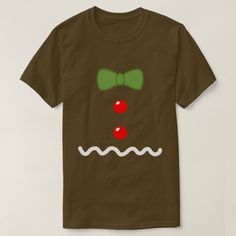 a brown t - shirt with a green bow tie and two cherries on it