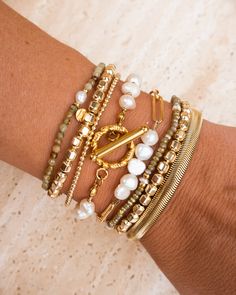 Every stack could use some sparkle, and our shimmer bead bracelet features faceted beads that catch the light at any angle. This bracelet will layer so well with any of our current bracelets, and best part is you never have to take it off! 14k gold fill 4 mm Sizing: Made to a standard 6” and can stretch to 6.5” Please measure wrists accordingly. Faceted Yellow Gold Beaded Bracelets For Everyday, Gold Faceted Beaded Bracelets For Everyday, Adjustable Faceted Gold Beaded Bracelet, Adjustable Gold Faceted Beaded Bracelet, Gold Stackable Wrap Bracelet For Stacking, Yellow Gold Faceted Beads Bracelet For Everyday Wear, Gold Wrap Bracelet With Round Beads, Trendy Gold Wrap Bracelet With Round Beads, Gold Bracelets With Tiny Beads For Layering