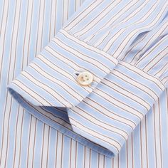 Original Retail Price: $950 Pre-owned - Good Condition US Size: 15.5 EU Size: 39 Slim Fit White Base Color with Blue and Brown Stripes 100% Cotton Button-Down Collar Standard Cuff Made In Italy Measurements Chest: 42.5" Back Length: 32.5" Sleeve Length: 25.75" This product is located in our EU warehouse. Button Down Dress, Button Down Collar, Base Colour, Button Downs, Stripes, Sleeve Length, Slim Fit, Blue, Color