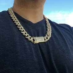 Men's 24"x 19 mm Cuban hip hop chain. 14K gold plated - high quality brass metal. Heavy chain has serious weight - 315 grams. Encrusted with round cut vivid CZ stones. Super stylish micro pave chunky box clasp. Chain shines hard - clean bright stones. A premium chain for the hip hop lifestyle. 100% FREE SHIPPING in USA. Order now! Gold Cuban Link Necklace For Streetwear, Gold Cuban Link Necklace With Curb Chain For Streetwear, Gold Chunky Chain Jewelry For Streetwear, Gold Cuban Link Jewelry For Streetwear, Gold Chain Link Jewelry For Streetwear, Gold Figaro Chain Jewelry For Streetwear, Gold Link Jewelry For Streetwear, Gold Chain Link Necklace For Streetwear, Gold Chain Necklace For Streetwear