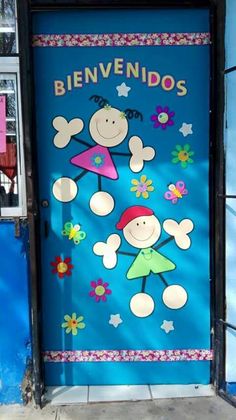 a blue door with cartoon characters painted on it