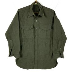 Vintage Us Army M2 Button Up Shirt Size Medium Green Wool 50s Size/Measurements (Based in inches) Size - Medium Pit to pit - 19.5" Length - 30" Shoulder to cuff - 23" Condition / Details Missing tag Stains on left sleeve and on front Combined Shipping: We provide combined shipping, please contact us for a quote Solid Button-up Camp Shirt With Buttons, Classic Green Shirt With Pockets, Classic Solid Camp Shirt With Button Closure, Classic Khaki Shirt With Pockets, Khaki Button-up Shirt With Placket, Classic Green Camp Shirt With Button Closure, Classic Collared Flannel Shirt With Snap Buttons, Khaki Shirt With Spread Collar And Buttons, Khaki Shirt With Buttons And Spread Collar