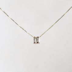 14k Gold Tiny Diamond Baguette Necklace Dainty Jewelry With Baguette Emerald Cut Diamonds, Dainty Emerald Cut Baguette Diamond Jewelry, White Gold Baguette Jewelry With Single Cut Diamonds, Baguette Shaped Single Cut Diamond Jewelry, 14k Gold Baguette Diamond Jewelry, Emerald Cut Diamond Necklace In 14k Gold For Anniversary, White Gold Emerald-cut Baguette Diamond Jewelry, 14k Gold Jewelry With Silver Baguette Diamonds, 14k White Gold Necklace With Baguette Cut