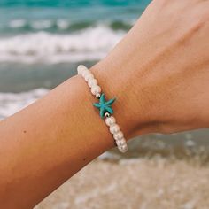 Handmade beaded starfish bracelet. Adjustable Starfish Beaded Bracelet, Adjustable Beaded Bracelet With Starfish Charm, Cheap Blue Bracelets With Starfish Charm, Starfish-shaped Bracelets With Colorful Beads As Gifts, Ocean-inspired Turquoise Starfish Beaded Bracelets, Adjustable Starfish-shaped Beaded Bracelet, Beaded Starfish, Beaded Charm Bracelet, Starfish Bracelet