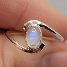 Moonstone Oval Sterling Silver Ring Blue Fire Flash Size: 5 See Mandrel Photo For Exact Sizing Stamped 925 Genuine Gemstone Condition: New With Size Tag Clear Stone That Flashes Blue Shifting In The Light Blue Fire Rainbow Moonstone Has A Gentle, Calming Energy. It Helps To Strengthen Intuition, Enhances Creativity, Compassion, Endurance And Inner Confidence. This Stone Brings Balance And Harmony. The Rainbow Effect Can Help With Clearing And Uplifting Energies. It Has Been Said To Have The Powe Dainty Moonstone Jewelry, Wedding Ring Moonstone Silver, Moon Stone Ring Vintage, Blue Moonstone Ring, Silver Rings With Gemstones, Silver Ring Gemstone, Moonstone Silver Ring, Oval Silver Ring, Silver Aquamarine Ring