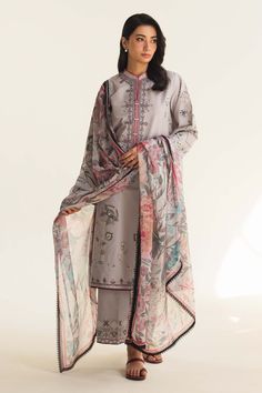 Brand New Coco by Zara Shahjahan Lawn - Zaira 9B Zaira, draped in grey masterpiece, emanatesenduring grace, embellished with intricate floral embroidery gracing every inch of the outfit, it's elevated by a floral chiffon shawl, enhancing every gaze. Fabric Details: Digital Printed Chiffon Dupatta 2.65 Yards Embroidered Dyed Lawn Front Center Panel 0.7 Yards Embroidered Dyed Lawn Front Panel 0.35 Yards Embroidered Dyed Lawn Back 1.09 Yards Embroidered Dyed Lawn Sleeves 0.7 Yards Embroidered Organza Neckline 1 Pc Embroidered Organza Border 5 Yards Embroidered Dyed Cambric Trouser 2.15 Yards For stitched orders, please select the corresponding size from the listed options. Once the order is placed, I will confirm the Shirt length, Trouser length, and Sleeve length. Note: The manufacturer does Zara Shahjahan Lawn, Eid Shopping, Zara Shahjahan, Chiffon Pants, Chiffon Shawl, Chiffon Floral, Chiffon Dupatta, Lawn Suits, Pakistani Suits