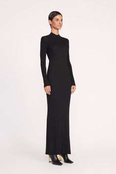 The Palmira Dress is our latest silhouette in our popular rib knit fabric; this style features a mock neck with a button closure and an open back. | STAUD, Palmira Dress in Black, Size Medium Ribbed Maxi Dress For Work, Elegant Fitted Maxi Dress By Staud, Elegant Fitted Staud Maxi Dress, Staud Fitted Maxi Dress For Evening, Elegant Ribbed Maxi Dress For Work, Staud Fitted Dress For Workwear, Sleek Ribbed Dress For Fall, Sleek Ribbed Fall Dress, Sleek Ribbed Dress