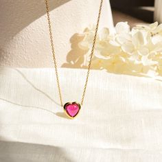 Our ruby heart gold necklace features a charming red gemstone in a heart-shaped gold pendant, combining elegance with a touch of romance. Perfect for birthdays, this cute necklace is a memorable and stylish gift for her. Style with ruby Earrings: https://rainbowrocksstudio.etsy.com/listing/1727349355  MEASUREMENTS  ✡ Centre Gemstone size: 8x8mm ✡ Pendant size: 10x10.9mm ✡ Chain length: 400mm+50mm (adjustable length)  MATERIAL  14k white gold vermeil Sterling silver base  GEMSTONE  Lab created ru Luxury Lab-created Ruby Necklace Gift, Valentine's Day Rose Gold Heart Necklace, Heart-shaped Birthstone Necklace As Gift For Her, Dainty Heart Birthstone Necklace For Valentine's Day, Pendant Necklace For Birthday And Valentine's Day, Elegant Heart Necklace For Valentine's Day Birthday, Elegant Heart Necklace For Birthday And Valentine's Day, Valentine's Day Dainty Heart Birthstone Necklace, Birthday And Valentine's Day Pendant Necklace