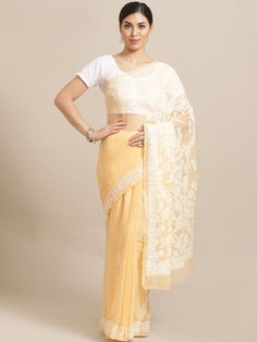 "Find more items of ADA:- https://www.etsy.com/in-en/shop/AdachikanStudio SKU: A204484 Fabric: Faux Georgette Length of the Saree: 5.50 meter Blouse Fabric: 1 meter Color: Carrot Pink Embroidery: Bakhiya , Keelkangan and Jaali Thread: White Cotton Touch and Feel: Soft and Comfortable Silhouette: Feel elegant with Ada Chikankari saree. The alluring Peach Faux Georgette saree weaved with white cotton thread. The fabric is lightweight and soft, best for any season use. Disclaimer: Blouse Shown for White Blouse With Sheer Dupatta For Diwali, Festive Blouse With Sheer Dupatta For Eid, Wedding Blouse With Chikankari Embroidery For Eid, Party Pre-draped Saree With Chikankari Embroidery, Eid Saree Blouse With Sheer Dupatta, Eid Puja Blouse With Sheer Dupatta, Fitted Organza Pre-draped Saree With Chikankari Embroidery, Pre-draped Saree With Sheer Dupatta For Navratri Puja, Yellow Chikankari Embroidered Fitted Pre-draped Saree