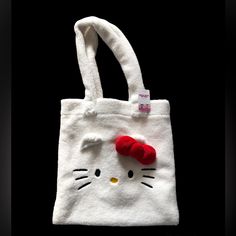 Forever 21 Hello Kitty Tote Bag White Cat Design Pouch Bag, White Hello Kitty Pouch Bag, Trendy Hello Kitty Pouch Bag, White Hello Kitty Bag For Daily Use, White Bag With Cat Design For Shopping, White Hello Kitty Print Bag, Hello Kitty Print Tote Shoulder Bag For Shopping, White Hello Kitty Print Bag For Daily Use, White Hello Kitty Print Shopping Bag