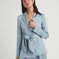 -Satin Effect Blazer With Lightly-Padded Shoulders And A Flattering Self-Tie At Waist.Lightly Padded Shoulders, Long Sleeves,Notched Lapel, Front Waist Tie. Color Light Blue, Nwt. Size 6. Notch Lapel Satin Outerwear For Fall, Fall Satin Notch Lapel Outerwear, Fall Satin Outerwear With Notch Lapel, Satin Long Sleeve Outerwear For Work, Spring Satin Outerwear With Long Sleeves, Spring Satin Long Sleeve Outerwear, Elegant Satin Blazer For Spring, Elegant Spring Satin Blazer, Spring Notch Lapel Satin Outerwear