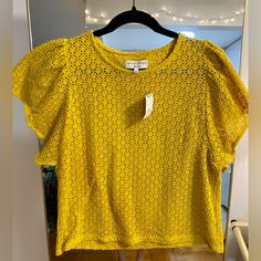 Brand New, Never Been Worn. Mustard Color Blouse With Flutter Sleeves In Large. Measures 20” Pit To Pit, 22.5” In Length. Spring Mustard Crew Neck Top, Mustard Crew Neck Top For Spring, Chic Mustard Short Sleeve Top, Chic Yellow Short Sleeve Tops, Mustard Short Sleeve Top For Day Out, Yellow Short Sleeve Blouse For Day Out, Mustard Short Sleeve Blouse For Spring, Mustard Short Sleeve Blouse For Summer, Yellow Crew Neck Blouse For Spring