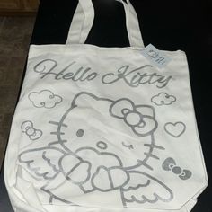 Forever21 Hello Kitty Canvas Tote Brand New With Tags Forever 21 Hello Kitty, Hello Kitty Tote Bag, Hello Kitty Canvas, Hello Kitty Tote, Forever 21 Bags, Plush Backpack, Phone Holster, Bag Ideas, Wallet Shop