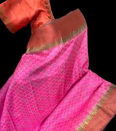 Bright pink pure kanchi pattu borders silk saree with prestitched blouse l   (wedding collection)  pure silk saree  with stitched  blouse  Blouse : fully stitched well made lined blouses with back ties size 36 goes upto 42 .  DETAILS AND CARE Color : pink silk saree  Weight : 600 - 800 grams Length : 5.5 m saree + 0.7 m blouse  Width : 48 Inches Fabric : Pure silk saree Craft Description : kanchi pattu saree  Wash Care : Dry Wash Only Shipping Time : 5 - 7 Working days We Ship Worldwide SHIPPING AND RETURNS Shipping Policy : Shipping days as mentioned above, subject to changes based on the government regulations around the prevailing pandemic situation.  Return Policy :   We have a comprehensive returns policy , kindly refer to our policy section to know more . DISCLAIMER color : There can Pink Tussar Silk Lehenga With Cutdana, Pink Tussar Silk Lehenga With Cutdana Detail, Pink Lehenga In Tussar Silk With Cutdana Details, Pink Tussar Silk Pre-draped Saree For Navratri, Festive Pink Tussar Silk Lehenga, Traditional Pink Pre-draped Saree In Chanderi, Pink Pre-draped Tussar Silk Saree In Traditional Drape, Pink Anarkali Style Lehenga In Tussar Silk, Traditional Pink Pre-draped Chanderi Saree