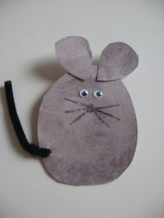 a paper mouse made to look like it is smiling