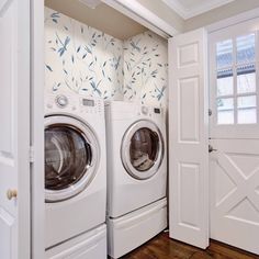 a washer and dryer in a small room