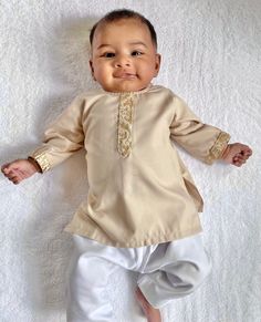 Eid orders will close on Monday, April 25, 2022 at 11:59pm ET. All orders placed after this time will be fulfilled after the Eid holiday. Shalwar / Pajama / Trouser sold separately: https://www.etsy.com/listing/771659464/infant-toddler-baby-shalwar-pajama?ref=shop_home_active_6&crt=1 Adorable, made-to-order kurta for infant, toddler and kid boys! Kurta ➤ Breathable and easy-to-wash cotton fabric ➤ Easy open and close clasp-buttons ➤ No-itch collar and sleeves ➤ Wide neck to easily fit over baby' Unstitched Festive Pant Set For Eid, Unstitched Pant Set For Eid Festivities, Festive Dabka Work Pant Set For Eid, Unstitched Pant Set For Eid Festival, Dabka Pant Set For Eid, Wedding Festivals Pant Set With Straight Kurta, Bollywood Style Pant Set For Weddings And Festivals, Bollywood Style Wedding Pant Set For Diwali, Bollywood Style Wedding Pant Set For Festivals