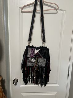 Black/gray/lavender hippie/boho bag/purse with embroidered adjustable guitar strap. Bohemian Crossbody Bag Strap For Everyday Use, Bohemian Shoulder Bag With Long Strap For Everyday Use, Bohemian Shoulder Bag With Long Strap, Bohemian Crossbody Bag With Detachable Strap, Bohemian Shoulder Bag With Long Strap For Travel, Bohemian Rectangular Bag With Long Strap, Black Bohemian Hobo Bag, Bohemian Bags With Long Strap For Daily Use, Bohemian Bag With Long Strap