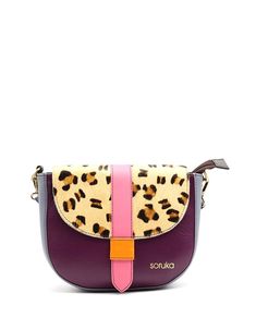 Beautiful 100% Recycled Leather Crossbody Shoulder Bag. Eco-friendly Handmade Bag in Shades of Purple and with Animal print flap. This colorful medium saddle-shaped bag is unique and will definitely make a statement when you wear it. Perfect size to fit all your everyday items. This crossbody purse has a main compartment with an inside zipper pocket. It fastens with a zipper and a leather slide closure for extra security. The purse comes with an adjustable-extending leather shoulder/cross-body s Multicolor Flap Shoulder Bag With Adjustable Strap, Multicolor Crossbody Flap Bag With Adjustable Strap, Multicolor Shoulder Flap Bag With Adjustable Strap, Multicolor Top Handle Satchel With Mobile Phone Bag, Multicolor Leather Saddle Bag For Daily Use, Multicolor Crossbody Flap Bag, Multicolor Leather Crossbody Satchel, Multicolor Crossbody Flap Bag For Travel, Multicolor Leather Pouch Shoulder Bag