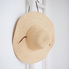 Ghanaian Straw Hat – connectedgoods.com Adjustable Wide Brim Panama Hat In Palm Leaf, Adjustable Flat Brim Palm Leaf Hat, Adjustable Artisan Sun Hat For Spring, Adjustable Palm Leaf Hats With Flat Brim, Adjustable Palm Leaf Hat With Flat Brim, Bohemian Palm Leaf Hat Bands For Vacation, Bohemian Palm Leaf Hat Bands For Summer, Adjustable Wide Brim Palm Leaf Hat, Adjustable Palm Leaf Fedora Hat