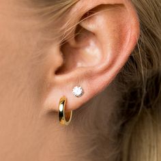 Introducing the "Polished Round Huggie Hoop Earring in Yellow Gold" these small hoop style earrings are the ultimate basic and a must-have in your jewelry collection. These hoops are such a classic, with the polished yellow gold, they give a beautiful glow to any look. You can feel comfy rocking these huggies all summer long since they are water proof and sweat proof. Paired with our "Herringbone Necklace In Yellow Gold" you have the perfect every day set to take you from day to night! This prod Bridal Earrings Chandelier, Herringbone Necklace, Sparkle Necklace, Solid Gold Earrings, Vermeil Jewelry, Elegant Bracelet, Custom Earrings, Huggie Earrings, Classic Jewelry