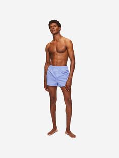 Our modern fit boxers feature a streamlined shape for a flattering design that remains comfortable. An elasticated waistband, curved leg seams and side vents ensure longevity and practicality, whilst our self-seeking magnetic fly closure is a hidden blessing. This simple but revolutionary feature allows easy opening and hassle-free closure of the fly. These boxers are made from our signature cotton batiste fabric with a soft finish and a plain, open weave that is designed to be ultra-smooth on t Blue Boxer Briefs For Gym In Summer, Sporty Blue Boxer Briefs With Elastic Waistband, Blue Boxer Briefs For Gym, Blue Short Length Boxer Briefs For Gym, Blue Relaxed Fit Boxer Briefs For Summer, Stretch Blue Boxer Briefs With Elastic Waistband, Sporty Fitted Cotton Swim Trunks, Fitted Boxer Briefs For Summer Daywear, Fitted Short Boxer Briefs For Daywear