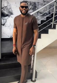 This elegant African men's Outfit is specially designed to make you look unique among others in all occasion. our cloths are made with quality fabric, great sewing, neat finishing and the price is affordable. The cloths are of different colors you can choose any color of your choice. Please contact us to make you look unique in all event. Formal Brown Cotton Sets, Casual Outfits Men Fall, Men Senator Designs, Dashiki Outfit, Dashiki For Men, African Suit, Nigerian Men Fashion, Kaftan Designs, African Wear Styles For Men