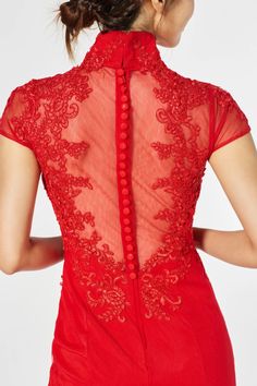 Show off that neckline and back with this illusion lace wedding cheongsam. If you got it, flaunt it. This cheongsam is our perfect mix of modern and traditional elements for your wedding or special event. Designed with a gorgeous sheer button back.  #chineseweddingdress #chineseqipao #chinesecheongsam #weddingqipao #weddingcheongsam #moderncheongsam #modernqipao #asianamericanwedding #redqipao #mermaidqipao #mermaidcheongsam #lacecheongsam #laceqipao #sheerback #teaceremonydress #eastmeetsdress Qipao Dress Traditional, Qipao Wedding Dress, Red Chinese Wedding Dress, Melinda Dress, Tea Ceremony Dress, Traditional Qipao, Wedding Dress Modern, Wedding Cheongsam, Qipao Wedding