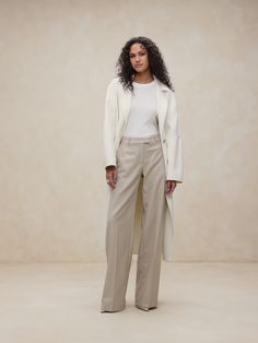 From boardroom to cocktail bar, this wide-leg trouser will have you feeling confident with an exquisitely tailored fit and a not-too-wide leg.  Crafted from a timeless all-season wool fabric from Italian mill Marzotto.  WIDE-LEG FIT: High waisted.  Straight from waist to hip with a pleated front and wide leg.  Extra long - so you can wear them with heels.  Zip fly with hook-and-bar closure.  Belt loops.  Front and back pockets.  Unlined.  Wide-Leg Fit: High-rise (11").  Straight through the hip Feeling Confident, Wool Pants, Cocktail Bar, Wool Fabric, Extra Long, High Rise, Wide Leg, How Are You Feeling, Trousers