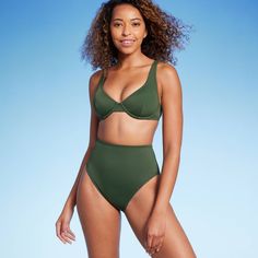 Add a versatile and stylish staple to your collection of swim separates with this High Waist High Leg Ribbed Medium-Coverage Bikini Bottom from Shade & Shore™. Made from soft fabric with spandex and full lining, this medium-coverage bikini bottom is designed with a high waist and high leg. Easy to pair with a variety of bikini tops, the four-way-stretch design and elastic at the leg openings provide stretchy comfort in and out of the water, while the ribbed texture adds a touch of visual interes Solid Color Swimwear With Built-in Bra, Solid Underwire Swimwear With Removable Bra Pads, Solid Nylon Swimwear With Padded Cups, Solid Swimwear With Removable Bra Pads And Contoured Fit, Solid Color Nylon Swimwear With Padded Cups, Padded Underwire Swimwear For Beach Season, Seamless Contoured Swimwear In Solid Color, Contoured Solid Swimwear With Removable Bra Pads, Contoured Seamless Solid Swimwear