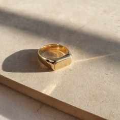 This is a one-of-a-kind piece and genderless ring made with Recycled Silver 925 and Gold Vermeil. The ring comes without engraving, but if you would like it engraved, please just follow our listing for engraving: https://www.etsy.com/uk/listing/1142303650/monogram-engraving Material: Sterling Silver 925 and Gold Vermeil Gold vermeil is a high-quality form of gold plating in which a thick layer of gold ( 10 microns of 18k gold) is coated upon sterling silver. It has a 1-year guarantee and lifetim Classic 14k Gold Signet Ring Stamped 925, Sterling Silver 14k Stamped Rings For Everyday, Minimalist Hallmarked Dome Ring For Everyday, Classic Everyday Rings Stamped 925, Classic Rectangular Engraved Ring For Everyday, Minimalist Thick Band Ring For Gift, Everyday Engraved 14k Ring, Classic Everyday Engraved Rectangular Ring, Classic Stackable Rectangular Rings