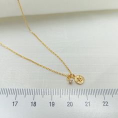 "∙ M I N I ∙ S A N D ∙ D O L L A R ∙ N E C K L A C E ∙  18K gold plated over sterling silver.  Best gift for her. Best friend gift. Valentine's day gift idea. Sand dollar necklace that are perfect for spoiling yourself or gifting. Minimalist necklace with CZ diamond charm it will be the right choice for your daily use. Style * Minimalist jewelry * Handmade jewelry * Gold sand dollar * Necklace woman * Sand dollar *  *  * Sand dollar pendant * Lucky pendant * Mom gift *  P R O D U C T - D E S C R Dainty Charm Necklaces For Gifts, Dainty Charm Necklace For Gift, Spoiling Yourself, Sand Dollar Necklace, Schmuck Gold, Necklace Woman, Gold Sand, Mini Charm, Best Gifts For Her