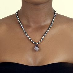 One of the oldest and most desired gemstones. For centuries, pearls have been associated with wealth, purity, wisdom and patience. They are also often referred to as the queen of gems. Spiritual Pearl Pendant Necklace, Purple Gemstone Amulet Necklace, Spiritual Pearl Crystal Necklace Gift, Spiritual Necklace With Pearl Pendant And Round Beads, Spiritual Pearl Crystal Necklace For Gift, Spiritual Pearl Necklace With Round Beads, Spiritual Pearl Drop Necklace With Round Beads, Teardrop Pendant With Natural Stones For Meditation, Teardrop Pearl Necklaces With Gemstones