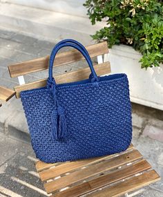 This beautiful navy blue straw handbag is perfect for any occasion! It's handmade with Crochet details and has a luxury feel to it. Whether you're carrying it as a shoulder bag or handbag, it's sure to make a statement. ⭐ PRODUCT DETAILS ⭐ -It is crochet. It is knitted with a double layer of paper yarn. -It is lined and has pockets. -Not washable, not dry clean. It can be wiped with a damp cloth. -Since it is handmade, delivery time may vary between 10-15 days. -Made in Turkey. *Materials: Paper yarn *Dimensions: 17.75 x 15.75 inches / 45 x 40 cm *Color: Navy Blue, Beige, Rowan Striped, Chocolate, Rowan, Beige Striped, Cherry, Black Striped, Fuchsia Striped, Powder Pink, Electric Blue Striped 🛍️ PERSONALIZATION *If you want to ask for a special change about the bags please feel free to co Rectangular Braided Crochet Bag For Shopping, Blue Straw Summer Bag, Braided Crochet Tote Bag For Daily Use, Summer Blue Straw Bag, Blue Woven Top Handle Bag, Blue Handwoven Top Handle Bag, Daily Use Braided Crochet Tote Bag, Blue Straw Tote Bag, Blue Top Handle Straw Bag For Shopping