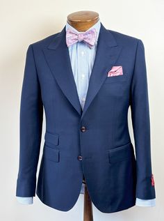 Shown, In the Luca 2-button, single breasted, peak lapel, side-vent model, with a hand-picked edge and imitation buttonholes. Made in 90% super 150's all wool and 10% cashmere all season 9.0oz fabric. Resulting in a soft beautiful drape suit, and memory for your shape as you wear the garment. Two Fit Models: Shown, Luca Is an updated trimmer fit with a 7" drop Also offered in the classic Fit Milano 6" drop model with notch lapels. Allow 5-7 days for delivery Semi-formal Notch Lapel Tweed Jacket, Dapper Semi-formal Tweed Jacket With Notch Lapel, Semi-formal Dapper Tweed Jacket With Notch Lapel, Timeless Tweed Jacket With Notch Lapel And Pressed Crease, Bespoke Tailored Tweed Jacket For Formal Occasions, Bespoke Tailored Tweed Jacket For Formal Events, Tailored Sport Coat With Pressed Crease For Semi-formal Occasions, Dapper Single Breasted Three-piece Suit For Formal Occasions, Dapper Single-breasted Three-piece Suit For Formal Occasions