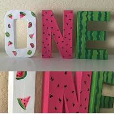 the letters are painted with watermelon designs