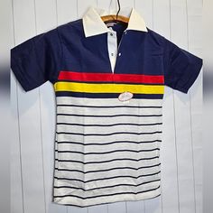 Perfect Condition Vintage Polo Shirt Kids Size 14 B3 Blue Cotton Shirt With Contrast Stripes, Casual Blue Shirt With Contrast Stripes, Striped Color Block Cotton Shirt, Cotton Color Block Collared Top, White Collared Shirt With Contrast Stripes, Retro Blue Polo Collar T-shirt, Casual Multicolor Polo Shirt With Striped Collar, Blue Polo Collar Top For School, White Color Block Cotton Polo Shirt