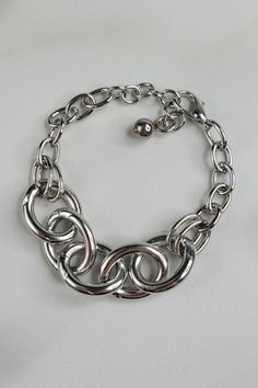 Yin Bracelet with Rhodium Plated Mixed Cable Chain - Handmade Indie Jewelry Modern Silver Jewelry With Adjustable Chain, Modern Silver Link Jewelry, Silver Cable Chain Jewelry For Party, Silver Jewelry With Cable Chain For Party, Adjustable Silver Charm Bracelet With Chain, Silver Metal Bracelet With Adjustable Chain, Silver Jewelry With Chunky Chain, Silver Metal Jewelry With Oval Link, Sterling Silver Bracelet With Cable Chain In Silver