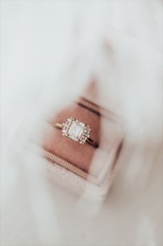 While listening to the song "1922", by the band Box the Oxford, Sarah was inspired to create this amazing collection. So of course, we had to name a ring after them! Our Oxford 14k gold ring rocks a vintage vibe while being thoroughly modern. The brilliant emerald cut 1 ct center stone sets the architectural tone, while the .17 ct tapering side baguette and round diamonds make this stunner truly sing. Emerald Cut Ring, Emerald Cut Rings, 14k Gold Ring, Vintage Vibe, Vintage Vibes, Stone Settings, Emerald Cut, The Song, The Band