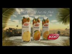 an advertisement for kodak fruit juice with oranges and pineapple