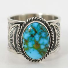 Sterling Silver Ring with Intricate Hand Stamped Designs and set with Natural Kingman Turquoise from Arizona by Navajo Silversmith, Sunshine Reeves. Ring Size: 9.25.5” Setting Width, .75” Setting Height.5” Band Width Zuni Jewelry, Concho Belt, Navajo Jewelry, Southwestern Jewelry, Kingman Turquoise, Pendant Rings, Stamp Design, Sterling Silver Ring, Hand Stamped