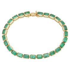 This Vivid Green Natural Emerald Tennis Bracelet Mounted in 18K gold showcases 26 endlessly sparkling natural emerald, weighing 12.5 carat. It measures 7.5 inches long in length. Emerald gemstone enhances the intellectual capacity of the person. Designed with perfect octagon cut emerald to make you stand out on any occasion or event. The elegant style complements the attire beautifully and is a perfect gift for anyone on your list. PRODUCT DETAILS :- Material - 18K Solid Yellow Gold Gemstone - Emerald Stone Weight - 12.5 ct Stone Shape - Octagon Stone Pcs - 26 Stone Size - 3 x 5 mm Gross Weight - 13.942 Grams Setting - Bezel setting Length - 7.5 inch Width - 4 mm We can customize the Gold Gemstone Bracelet according to your specification. Go to our Storefront Page for more updates and clic Emerald Tennis Bracelet, Emerald Bracelets, Bracelet Tennis, Emerald Bracelet, Gold Armband, Emerald Stone, Emerald Gemstone, Natural Emerald, Tennis Bracelet