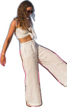 White Linen Wide Leg Pants For Vacation, White Linen Wide Leg Vacation Pants, Casual Linen Harem Pants For Vacation, Beach Harem Pants With Pockets In Linen, Solid Linen Pants For Vacation, Summer Linen Harem Pants With Elastic Waistband, Beach Linen Harem Pants With Pockets, White Linen Pants For The Beach, Loosely Fitted Linen Harem Pants For Vacation