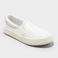 Refresh your child's footwear with these Colby Slip-On Sneakers from Cat & Jack™. These closed-toe sneakers boast a faux-leather upper in a solid hue and a round toe, providing a medium shoe width. Enhanced with a padded collar and convenient slip-on style with elastic gores, the shoes keep your child comfortable wherever they go. Cat & Jack™: Designed for all children so you can trust it's made for yours. Construction For Kids, Plastic Heels, Rubber Shoes, Baby Shorts, Colby, Cat & Jack, Slip On Sneakers, Short Girls, Apparel Accessories