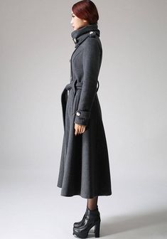 "Double breasted coat that's been expertly sourced by Xiaolizi. The military coat made from gray wool fabric in a super fitted button-down front closure. The long trench coat topped with a warm collar. The custom coat finished with long sleeves that feature button tabs. **DETAILS** * 50% wool, 50% polyester, polyester lining * An oversized collar with a buttoned tab * double breasted front with a button closure * long sleeve styling with button tabs to the cuff * diagonal pockets to the hips * m Winter Long Sweater Coat With Button Closure, Gray Double-breasted Winter Outerwear, Gray Winter Sweater Coat With Buttons, Gray Buttoned Outerwear For Winter, Winter Long Sweater Coat With Buttons, Long Winter Pea Coat With Button Closure, Gray Fitted Winter Pea Coat, Fitted Gray Winter Pea Coat, Fitted Gray Pea Coat For Winter