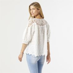 The details in this top are everything. Features cotton material, lace necklace, puff sleeves and scalloped hem. White Feminine Lace Top With Lace Trim, Feminine Cotton Lace Patchwork Top, Feminine Cotton Tops With Lace Sleeves, Feminine Cotton Lace Top With Lace Trim, White Scalloped Lace Top For Spring, Spring Lace Patchwork Cotton Tops, Spring Tops With Cotton Lace Patchwork, White Feminine Crochet Top With Lace Patchwork, White Crochet Top With Lace Patchwork