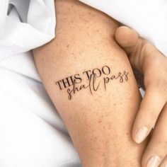 a woman's arm with the words, this do not pass tattooed on it