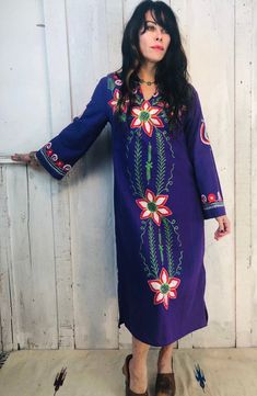 Vintage Indian Embroidered Kaftan Heaven!Gorgeous Purple With Vibrant Colors Of Red, White And Green In A Beautiful Hand Embroidered PatternFantastic Bohemian PieceFolk ArtSoft Vintage CottonCirca 1970sSize~ XS/SBust~19" seam to seam total 32-38"Waist~ 18”seam to seam total 24-38”Hips~ 18”total 32-38”Length~ 43” Bohemian Long Sleeve Kaftan With Intricate Embroidery, Bohemian Long Kaftan For Navratri, Festive Purple Embroidered Kaftan, Blue Embroidered Festival Kurta, Blue Embroidered Kurta For Festival, Bohemian Multicolor Embroidered Dress For Navratri, Purple Embroidered Kaftan For Eid, Embroidered Long Sleeve Purple Kaftan, Traditional Purple Kaftan For Festive Occasions