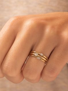 Pear diamonds are anything but basic and so is this Bitsy Ring! The unique cut does all the work on an elegant 14K yellow, white, or rose gold band for a dainty touch to your jewelry whether you wear it alone, add it to your stack, or pair it with all the rings from our Bitsy Collection. 14k Gold Stackable Promise Rings With Diamond Accents, Stackable Diamond Promise Ring Fine Jewelry, Stackable Diamond Promise Ring In Fine Jewelry, 14k Gold Stackable Rings With Diamond Accents For Promise, 14k Gold Diamond White Stackable Rings For Anniversary, Diamond White 14k Gold Solitaire Stackable Rings, Yellow Gold Diamond Stackable Rings With Solitaire, Stackable 14k Gold Diamond Ring With Round Cut, Diamond White Solitaire Stackable Rings In 14k Gold