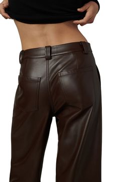 These figure-elongating wide-leg pants elevate the drama of any day or night outfit thanks to the sophisticated edge of faux leather. 27 1/2" inseam; 23" leg opening; 12" front rise; 15 1/2" back rise (size 29) 100% polyurethane Machine wash, dry flat Imported Brown Leather Pants For Night Out, Fall Brown Wide-leg Leather Pants, Sleek Brown Faux Leather Bottoms, Sleek Brown Leather Bottoms, Leather Wide Leg Pants For Fall, Fall Leather Wide Leg Pants, Brown Full Length Faux Leather Pants, Brown Full-length Faux Leather Pants, Chic Brown Leather Pants For Fall